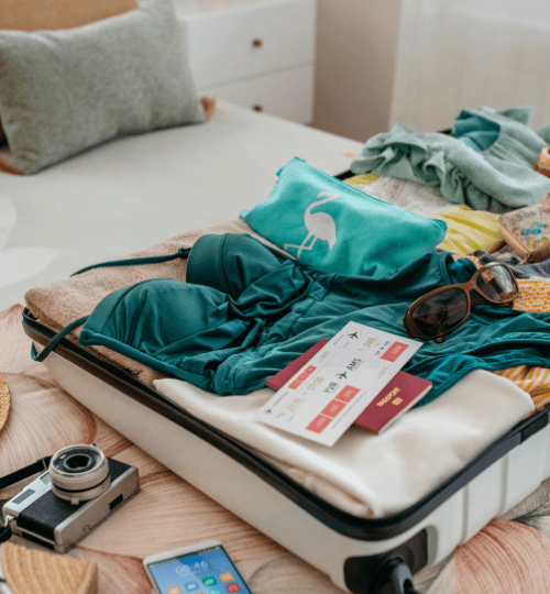 Open suitcase with clothes inside